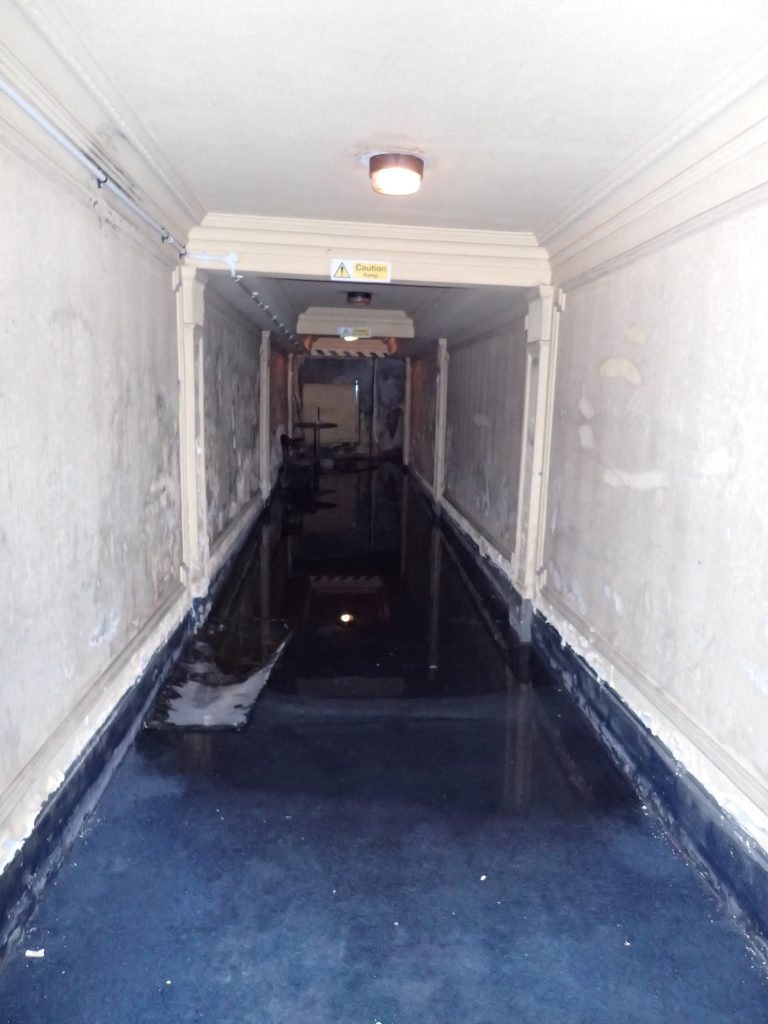 Flooding in basement corridor