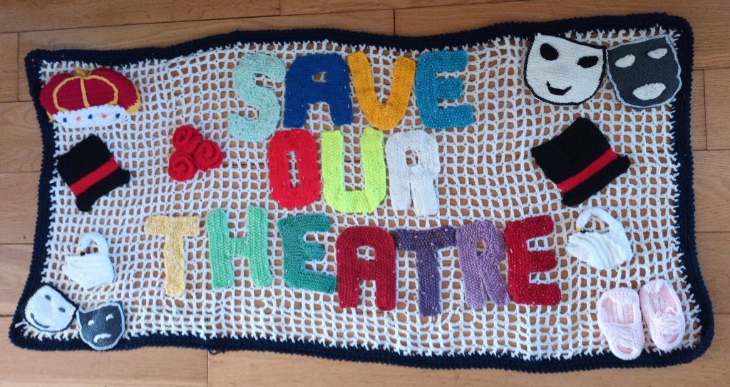 Knitted banner Save Our Theatre